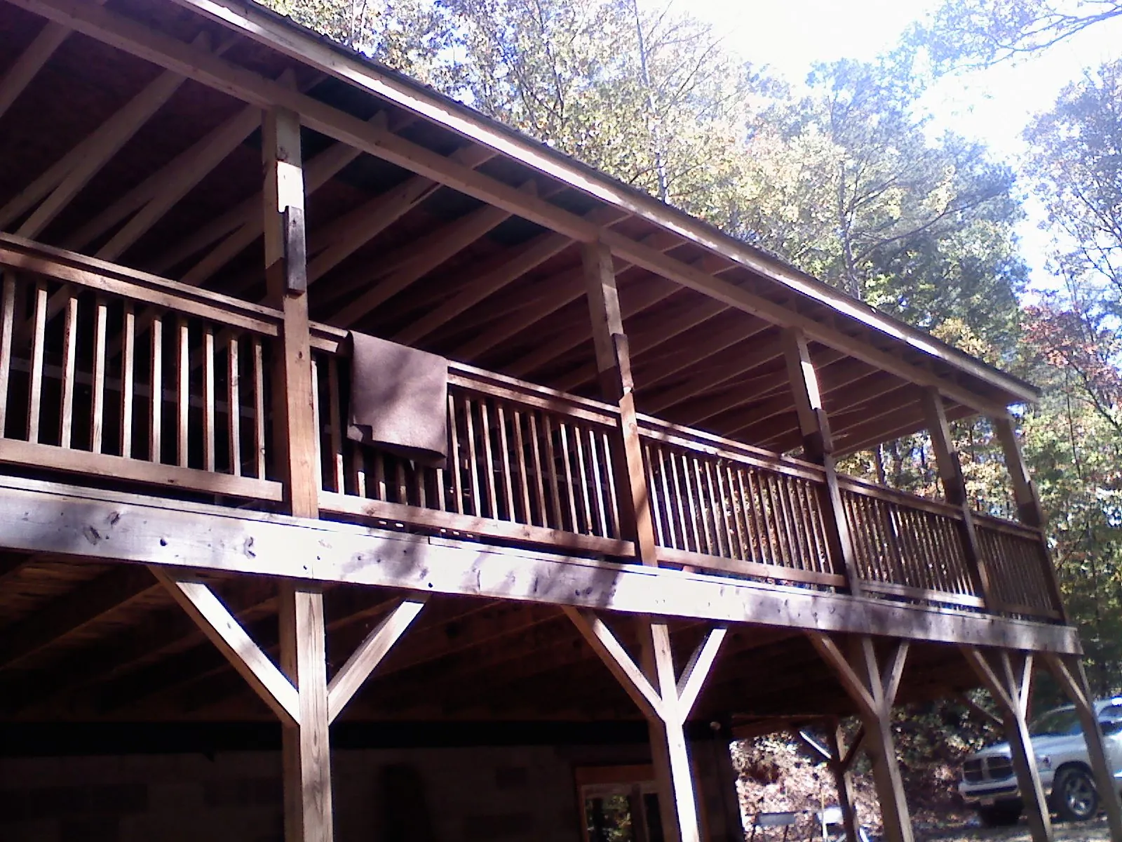 Timber framing under a new elevated porch and deck — Roof Leak Repair in La Verne by Roofing Brothers